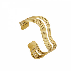 Brazalete Rígido estilo ondas de acero dorado