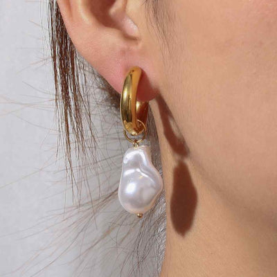 Les boucles d'oreilles perle